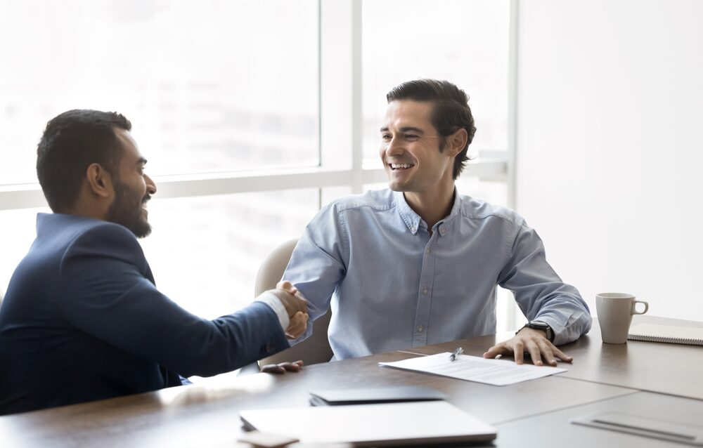 Two,Multinational,Businessmen,Shake,Hands,,Establishing,Professional,Partnership,,Congratulate,Each